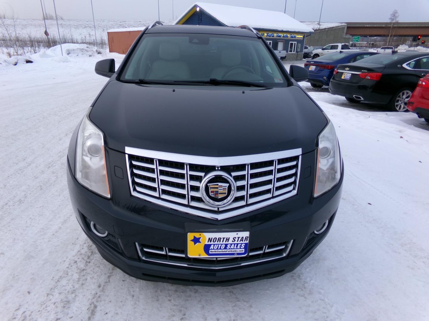 2014 Black Cadillac SRX Performance Collection FWD (3GYFNCE37ES) with an 3.6L V6 DOHC 24V FFV engine, 6-Speed Automatic transmission, located at 2630 Philips Field Rd., Fairbanks, AK, 99709, (907) 458-0593, 64.848068, -147.780609 - Photo#1